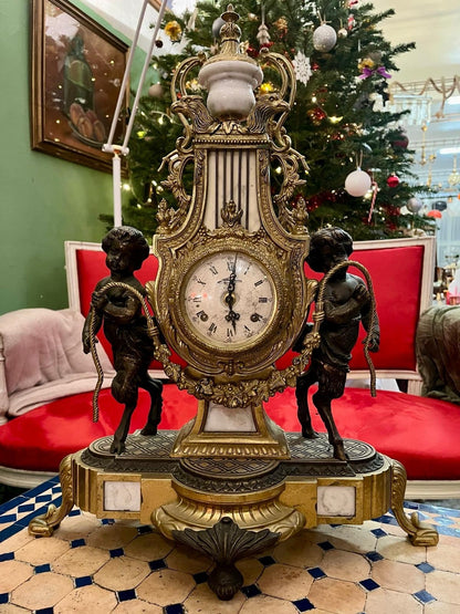 Pendule de cheminée Napoléon III aux angelo, XIXe Siècle