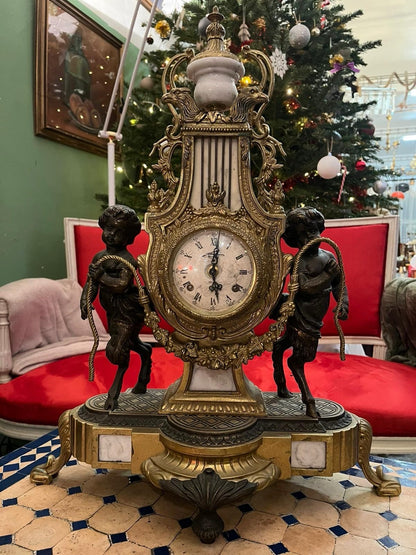 Pendule de cheminée Napoléon III aux angelo, XIXe Siècle
