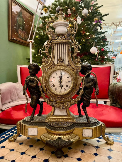 Pendule de cheminée Napoléon III aux angelo, XIXe Siècle