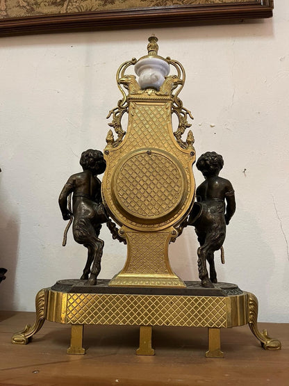 Pendule de cheminée Napoléon III aux angelo, XIXe Siècle