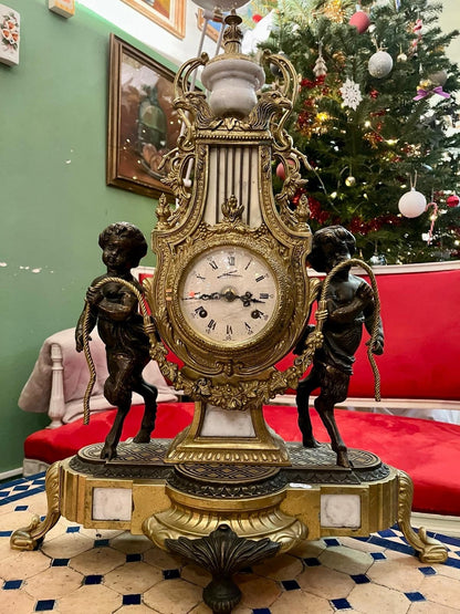 Pendule de cheminée Napoléon III aux angelo, XIXe Siècle