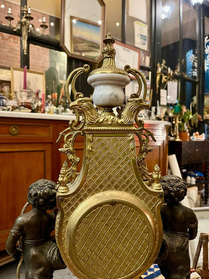Pendule de cheminée Napoléon III aux angelo, XIXe Siècle