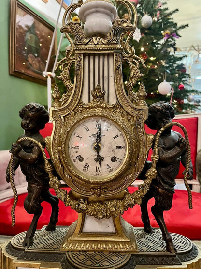 Pendule de cheminée Napoléon III aux angelo, XIXe Siècle