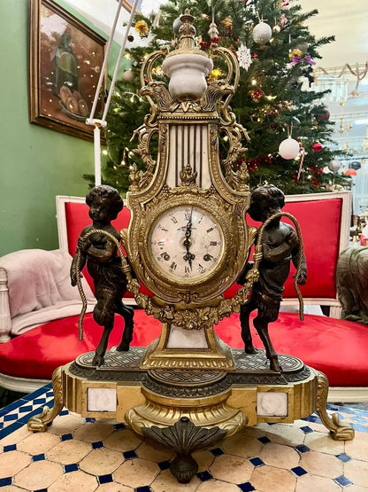 Pendule de cheminée Napoléon III aux angelo, XIXe Siècle