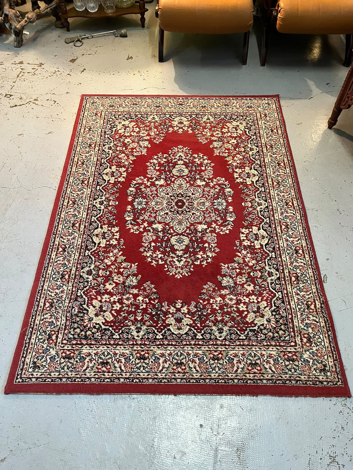 tapis style persan rouge à médaillon central 120 × 170 cm