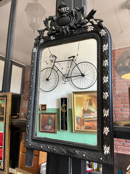 Miroir Napoléon III en bois noirci à décor floral incrusté