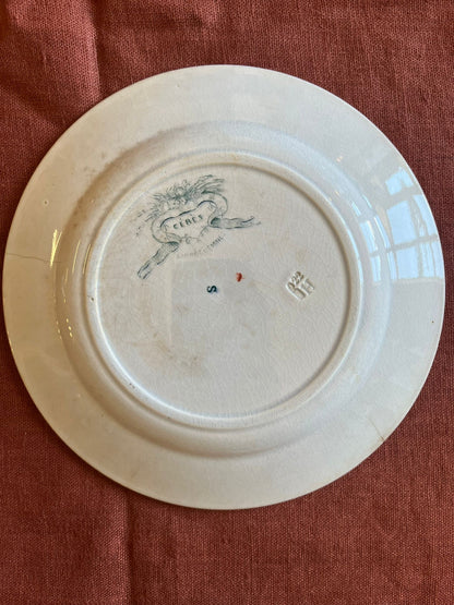 Assiette ancienne terre de fer Gien décor floral polychrome XIXe siècle
