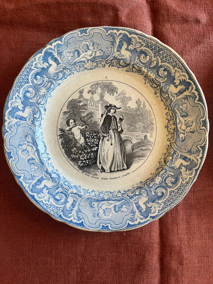 Paire d’assiettes anciennes terre de fer décor romantique XIXe