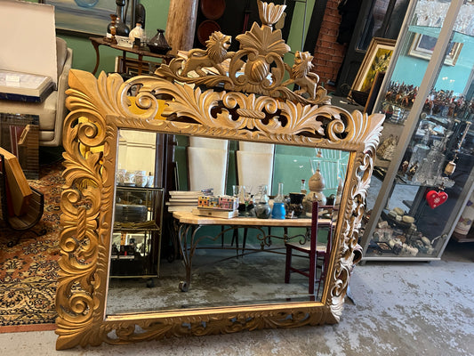 Grand miroir biseauté en bois doré art nouveau