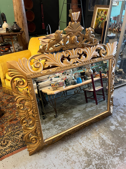 Grand miroir biseauté en bois doré art nouveau